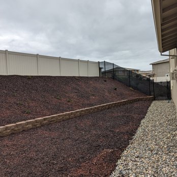 Sprinkler Plus - a hillside with a retaining wall - Irrigation Near Me Sprinkler Plus - a hillside with a retaining wall - Irrigation Near Me