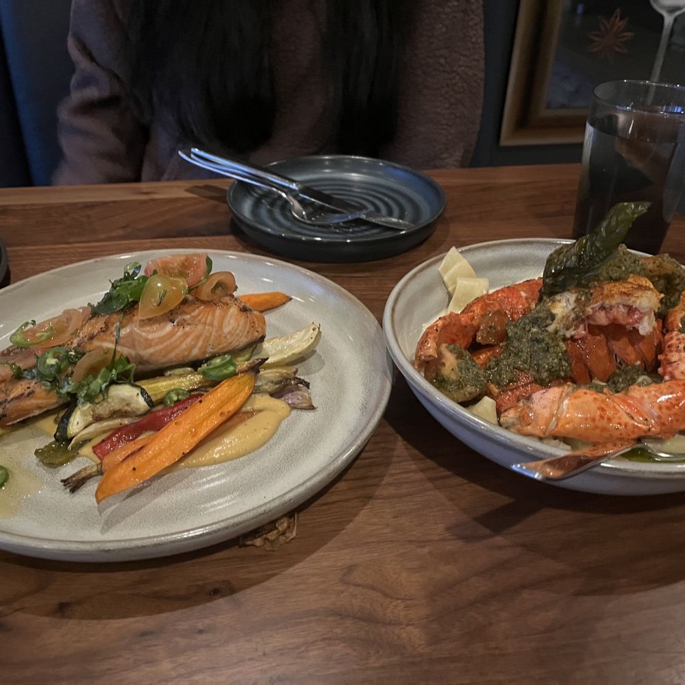 Shearwater Tavern - L: Grilled Pacific Salmon | R: lobster pappardelle (dinner special) - Bars Near Me - Carmel, California Shearwater Tavern - L: Grilled Pacific Salmon | R: lobster pappardelle (dinner special) - Bars Near Me - Carmel, California