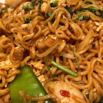 New Asian Taste - a plate of noodles with meat and vegetables - Malaysian Near Me - Battle Creek, Michigan New Asian Taste - a plate of noodles with meat and vegetables - Malaysian Near Me - Battle Creek, Michigan