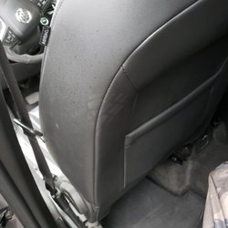 Hertz Rent A Car - Shoe marks on seat.