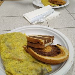 Veggie and Western omelets with rye.