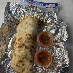 The Corner Stop - Punny little $6+ burrito, Notice how tough and over cooked the tortilla is.