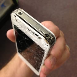 The iDoctor - This iPhone fell off of a motorcycle going down the road... This is the before picture.