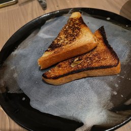 1 slice of toast - $4 1 slice of toast - $4