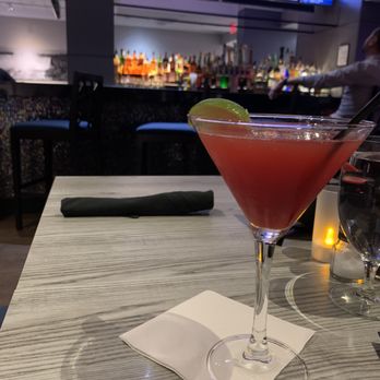 Hilton -American Grill - a martini with a lime garnish - Burgers Near Me - Orlando, Florida Hilton -American Grill - a martini with a lime garnish - Burgers Near Me - Orlando, Florida