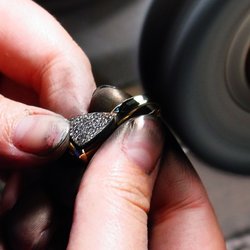 Koorey Creations - polishing a custom design pendant