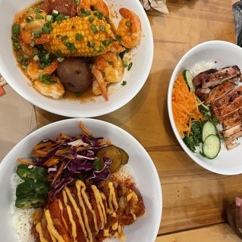 Pinch Boil House - Shrimp boil up top, Dirty bird down bottom and my kid friendly dinner on the right. - Seafood Near Me - San Antonio, Texas
