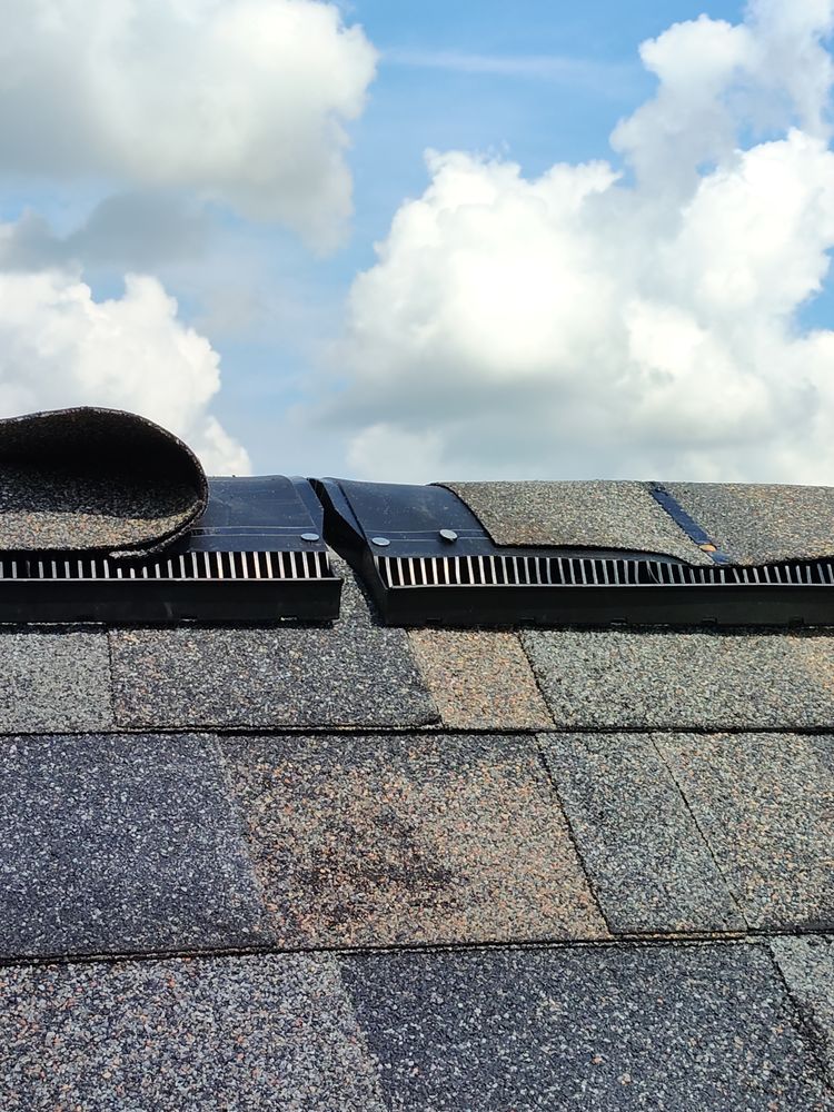 Slide of Lopez's Roofing