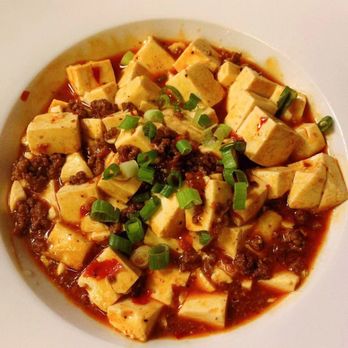 WOK IN - a bowl of tofu with sauce and green onions - Chinese Near Me - Saint John, New Brunswick WOK IN - a bowl of tofu with sauce and green onions - Chinese Near Me - Saint John, New Brunswick