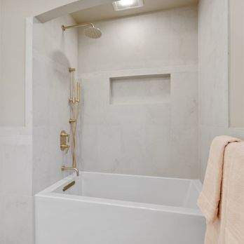 Touch Design and Build - Porcelain tile tub surround, gold trim - General Contractors Near Me