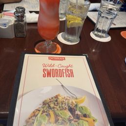 Menu and a drink. I can't think of the name of the drink but it did have Hennessy in it.