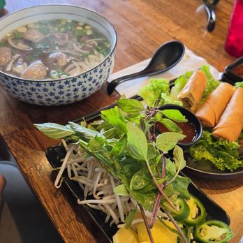 Fire Pho - Vegetable egg rolls and the 2 protein pho. We got the beef meatball and flank steak. - Vietnamese Near Me - Huntington Beach, California Fire Pho - Vegetable egg rolls and the 2 protein pho. We got the beef meatball and flank steak. - Vietnamese Near Me - Huntington Beach, California