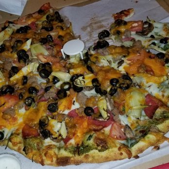 Donairo's Pizza - XL custom topping pizza after I ate one slice. - Pizza Near Me - San Francisco, California Donairo's Pizza - XL custom topping pizza after I ate one slice. - Pizza Near Me - San Francisco, California