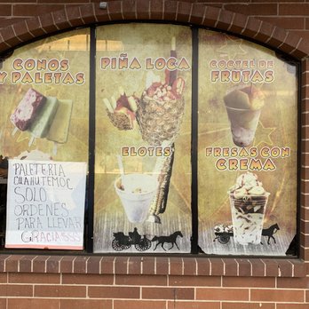 Paleteria Cuauhtemoc - a window display of ice cream - Ice Cream & Frozen Yogurt Near Me - Denver, Colorado Paleteria Cuauhtemoc - a window display of ice cream - Ice Cream & Frozen Yogurt Near Me - Denver, Colorado