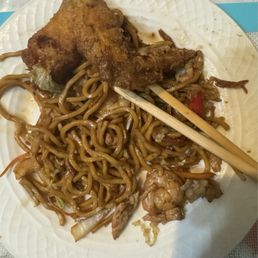 House Lo mein and a chicken wing. (On my plate not the restaurant's) House Lo mein and a chicken wing. (On my plate not the restaurant's)