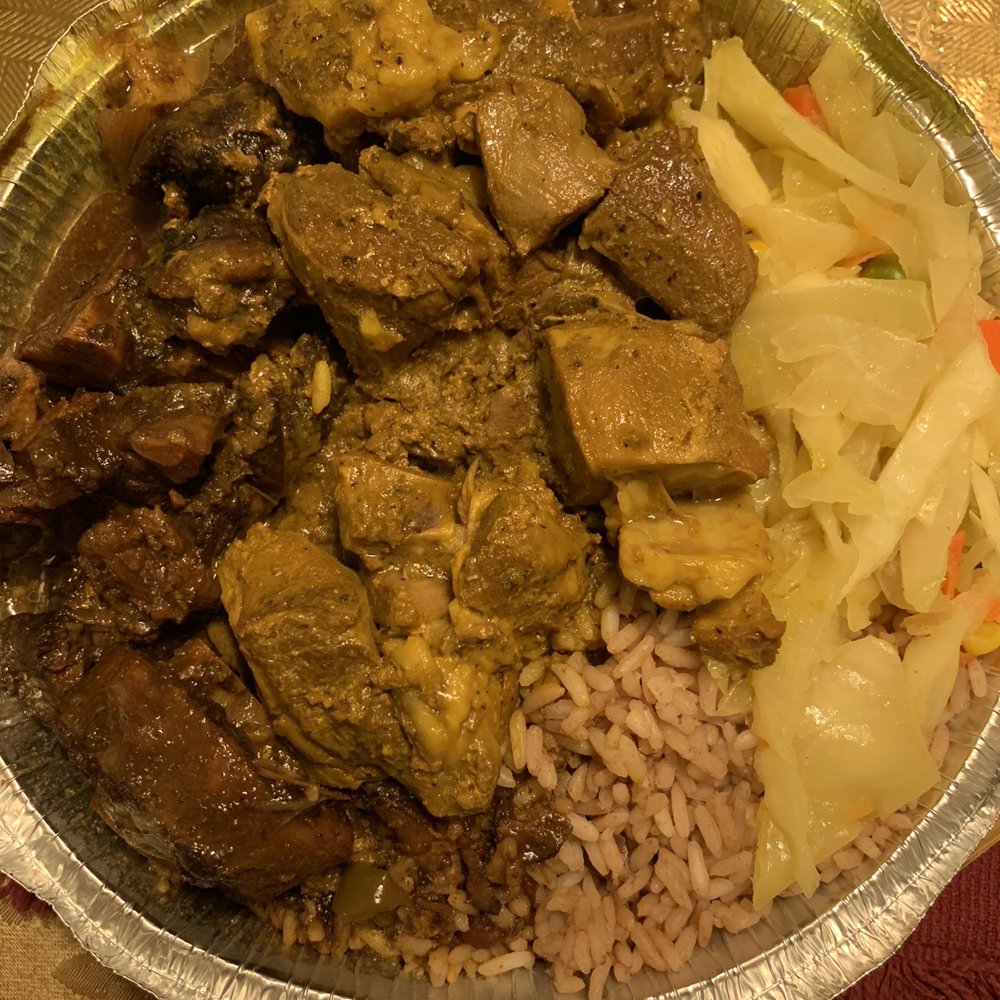 Curry Oxtail and Curried Goat Combo Platter Curry Oxtail and Curried Goat Combo Platter