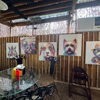 Frankie's Dawg House - Patio with fun dog artwork - Hot Dogs Near Me - Baton Rouge, Louisiana Frankie's Dawg House - Patio with fun dog artwork - Hot Dogs Near Me - Baton Rouge, Louisiana