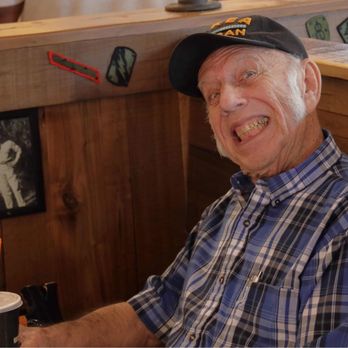 Mission BBQ - Ocala - Arnold cheesing it up with his picture circa 1954(?) - Barbeque Near Me - Ocala, Florida