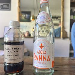 Fish Shop - Still bottle of water & local vinegar offered on the bar.