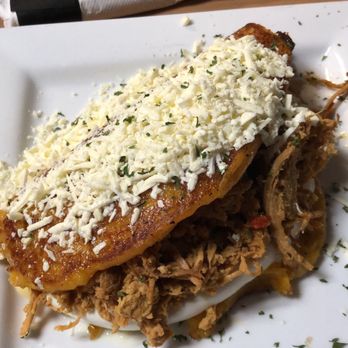 Wonder Arepa - Chachapa de pollo! Sweet corn shell filled with cheese and shredded chicken with more cheese on top. - Venezuelan Near Me - Orlando, Florida Wonder Arepa - Chachapa de pollo! Sweet corn shell filled with cheese and shredded chicken with more cheese on top. - Venezuelan Near Me - Orlando, Florida