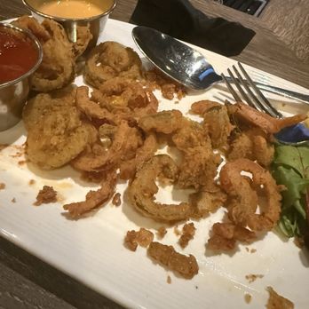 PrimeTime Restaurant - This is all the fried peppers. The flavorless squid was maybe only half of the total. Waste of money! - Breakfast & Brunch Near Me - College Park, Maryland