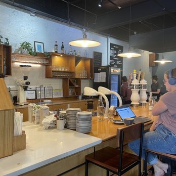 Dose Café & Dram Bar - people sitting at the counter - Coffee & Tea Near Me - Nashville, Tennessee
