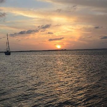 Sundowners - *sighs happily* Another picture-perfect postcard-view sunset from the back deck at Sundowners - Seafood Near Me - Key Largo, Florida Sundowners - *sighs happily* Another picture-perfect postcard-view sunset from the back deck at Sundowners - Seafood Near Me - Key Largo, Florida