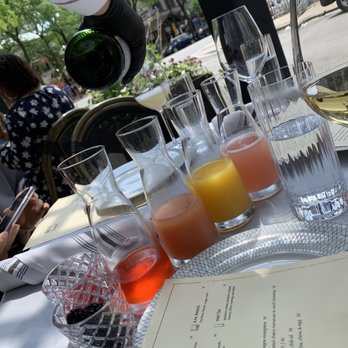 Maple & Ash - Expanded DIY mimosas - peach purée, OJ, grapefruit juice, strawberry infused aperol, berries - Steakhouses Near Me - Chicago, Illinois