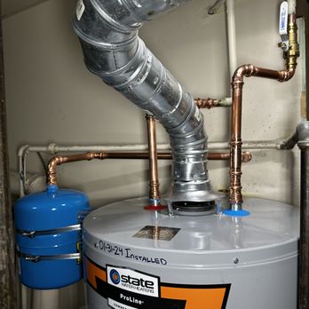 TMC Plumbing - Clean simple pipe work on water heater - Plumbing Near Me TMC Plumbing - Clean simple pipe work on water heater - Plumbing Near Me