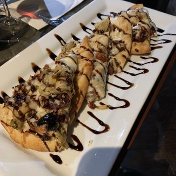 Twisted Vine - Sun-dried tomato and artichoke flat bread - Wine Bars Near Me - Fullerton, California Twisted Vine - Sun-dried tomato and artichoke flat bread - Wine Bars Near Me - Fullerton, California