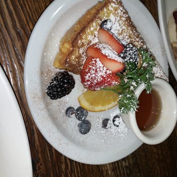Poached - One order French toast a la cart - Buffets Near Me - San Francisco, California Poached - One order French toast a la cart - Buffets Near Me - San Francisco, California