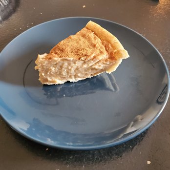 Papa Stew's Kitchen - a slice of pie on a blue plate - Barbeque Near Me