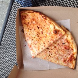 two slices of cheese pizza in a box two slices of cheese pizza in a box