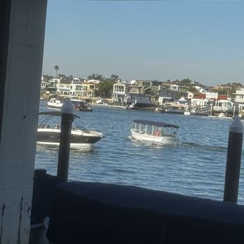 Harborside Restaurant - View from a window front table- watching the boats on a Sunday afternoon - American Near Me - Newport Beach, California Harborside Restaurant - View from a window front table- watching the boats on a Sunday afternoon - American Near Me - Newport Beach, California