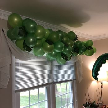 Pixie Smiles Entertainment - She transformed the living room into an island and it was glorious! - Face Painting Near Me