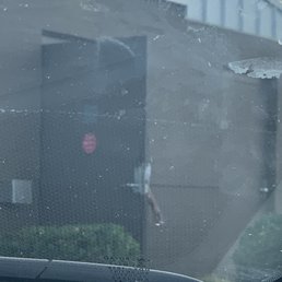 Employee smoking while holding open door to back kitchen. GROSS!!!!! Employee smoking while holding open door to back kitchen. GROSS!!!!!