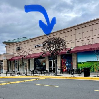 Starbucks - Outside / Exterior of shop (entrance behind tree lol) - in Plaza America sandwiched between Total Wine and Ann Taylor Loft - Coffee & Tea Near Me - Reston, Virginia Starbucks - Outside / Exterior of shop (entrance behind tree lol) - in Plaza America sandwiched between Total Wine and Ann Taylor Loft - Coffee & Tea Near Me - Reston, Virginia