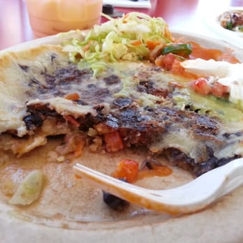 Doña Lola's - Pupusa with beans, queso fresco, and carnitas, the ultimate yum! - Food Trucks Near Me - Portland, Oregon