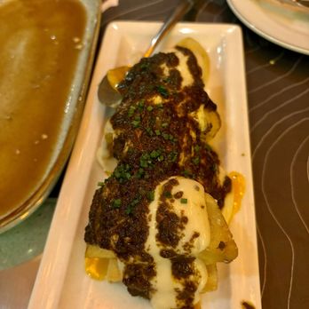 Elsa y Fred - Patatas Bravas - the photo doesn't do it justice. This dish was delicious. Fabulous. Fantastic. Order it and enjoy. - Tapas/Small Plates Near Me - Barcelona, B
