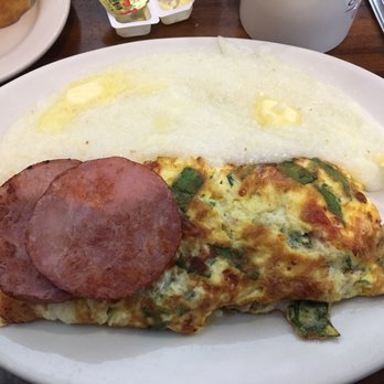 Valois - Mediterranean omelette with grits and biscuits. A side of Canadian bacon. - Breakfast & Brunch Near Me - Chicago, Illinois Valois - Mediterranean omelette with grits and biscuits. A side of Canadian bacon. - Breakfast & Brunch Near Me - Chicago, Illinois