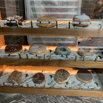 Blackbird Doughnuts - Beacon Hill - West End - a display of doughnuts - Donuts Near Me - Boston, Massachusetts Blackbird Doughnuts - Beacon Hill - West End - a display of doughnuts - Donuts Near Me - Boston, Massachusetts