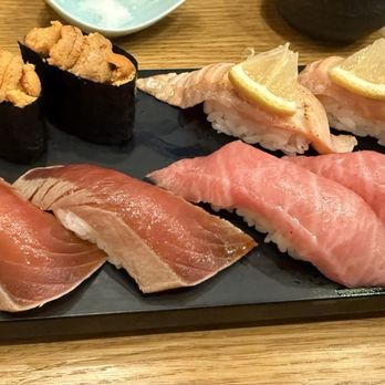 Sushi Zanmai - Top from left to right: Hokkaido Uni Sea Urchin, Seared Salmon Belly Bottom from left to right: Zuke Yellow Fin Tuna, Fatty Tuna Nigiri - Sushi Bars Near Me - Los Angeles, California
