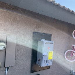 a bicycle hanging on a wall