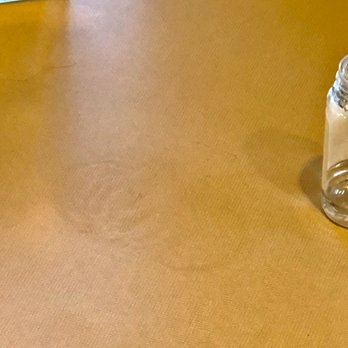 Belle Tire - Table has not been cleaned - Auto Glass Services Near Me - South Bend, Indiana