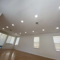Simply Electric - Nicely Laid Out Recessed LIghts With Equidistance In A Room Without Attic Access.