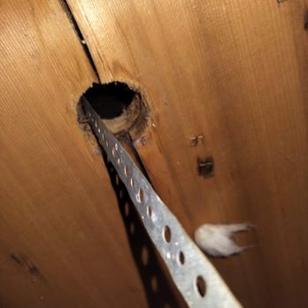 Attic Crew - penetration in the subfloor for a duct hanger - Insulation Installation Near Me - Seattle, Washington