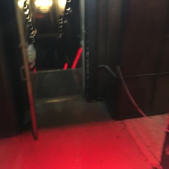 The Chvrch of John - a hallway with a red light - Bars Near Me - Edmonton, Alberta The Chvrch of John - a hallway with a red light - Bars Near Me - Edmonton, Alberta