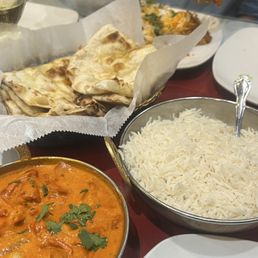 Butter Chicken, Chicken Biriyani, and Garlic Naan Butter Chicken, Chicken Biriyani, and Garlic Naan
