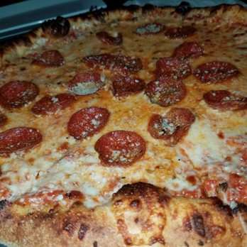 Pizza 216 - Pepperoni pizza with spicy red sauce - Bars Near Me - Cleveland, Ohio Pizza 216 - Pepperoni pizza with spicy red sauce - Bars Near Me - Cleveland, Ohio