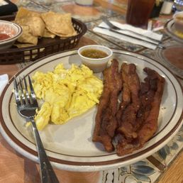 Breakfast plate with perfectly crisp bacon. Breakfast plate with perfectly crisp bacon.